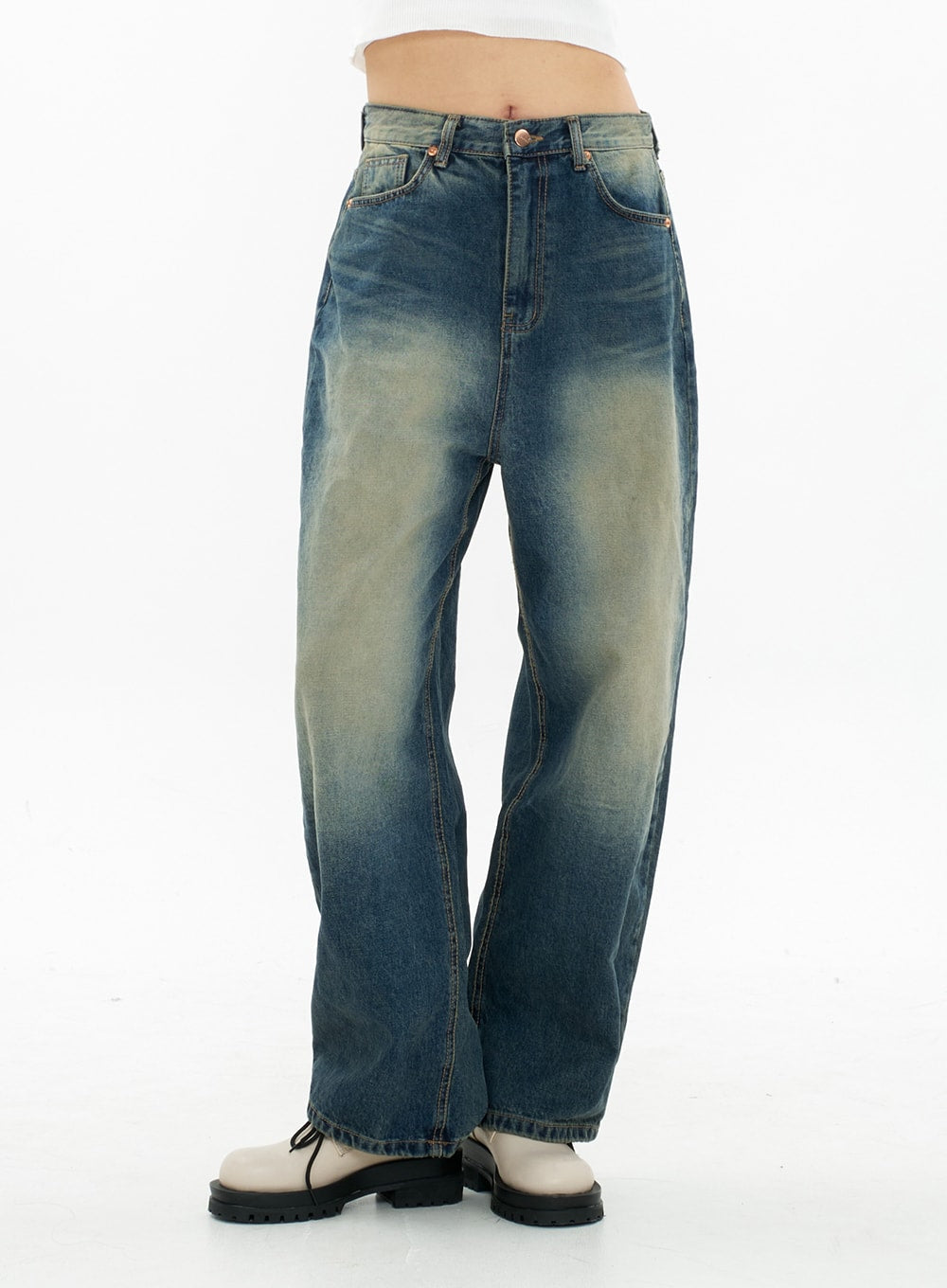 Bleached Wide Leg Denim Pants CA07 in vintage blue, front mid-body shot on model, close-up of waistband, button fly, front pockets, and yellow-toned bleach gradation on wide-leg denim.