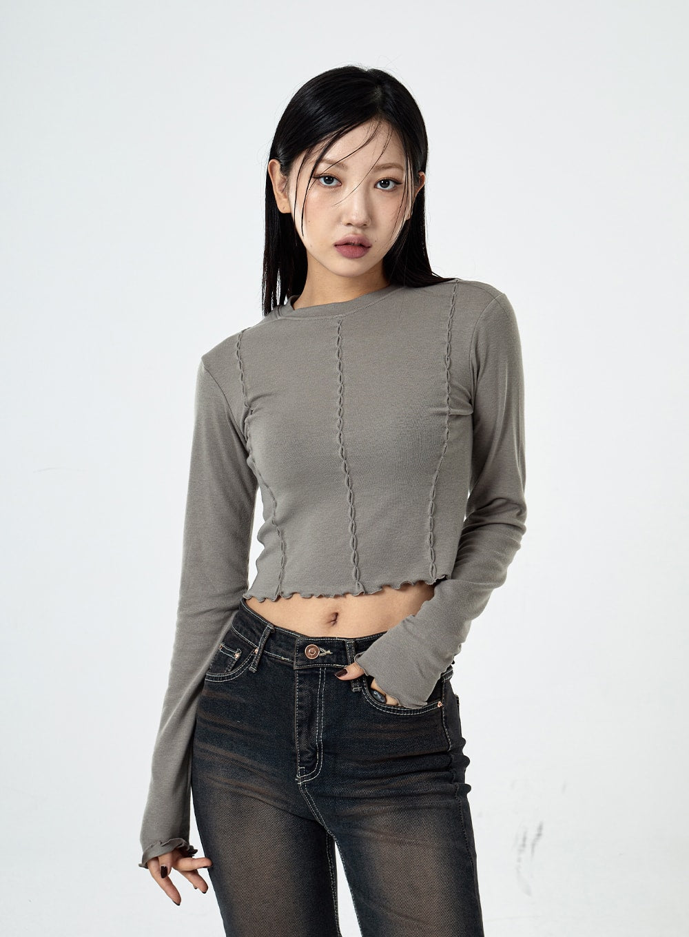 Basic Washed Bootcut Jeans CS07 in black washed denim, upper-thigh-to-waist detail on model, high-rise waistband, contrast stitching and button detail visible, paired with grey crop top.