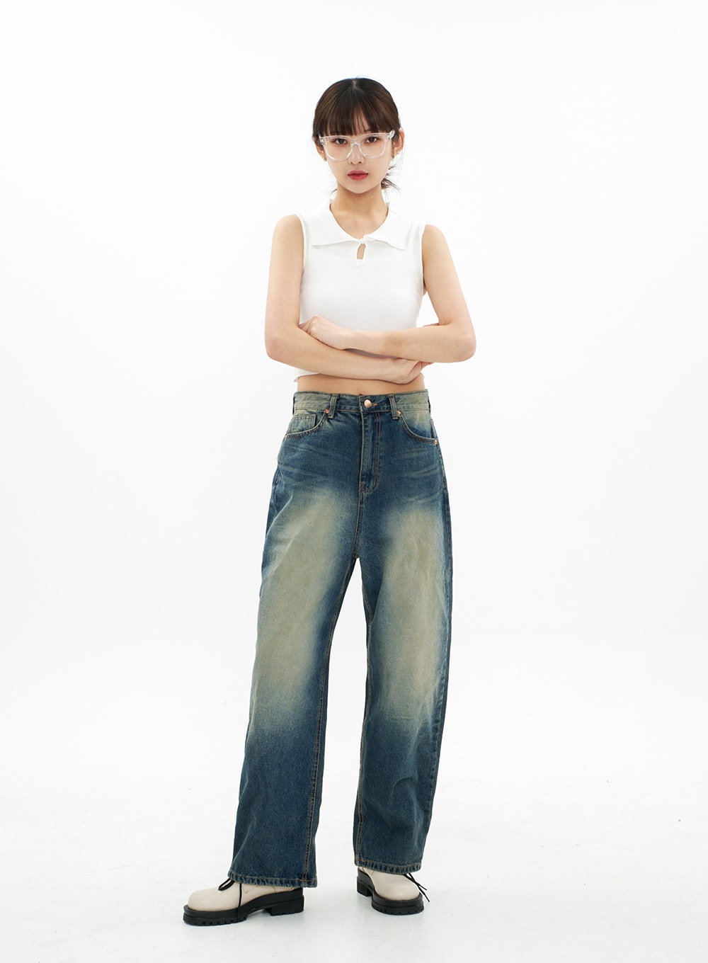 Bleached Wide Leg Denim Pants CA07 in vintage blue, full-body front view on model arms crossed, upright pose showing full-length wide-leg silhouette with bleached gradation cotton denim.