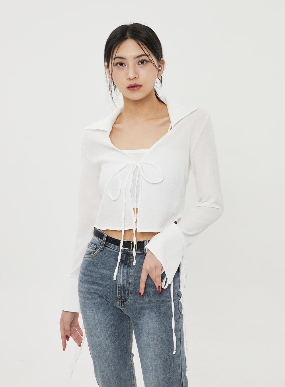 Straight Leg Ankle Jeans BF316 in mid-blue wash, three-quarter front view on model, slim fit with subtle fading, high waist and front pocket detail visible, styled with white crop top.