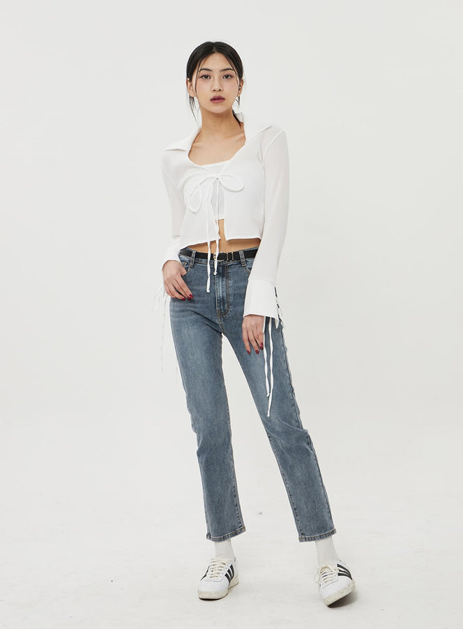 Straight Leg Ankle Jeans BF316 in mid-blue wash, front full-body on model standing, slim fit denim with visible front seam, high waist, styled with white crop top and sneakers.