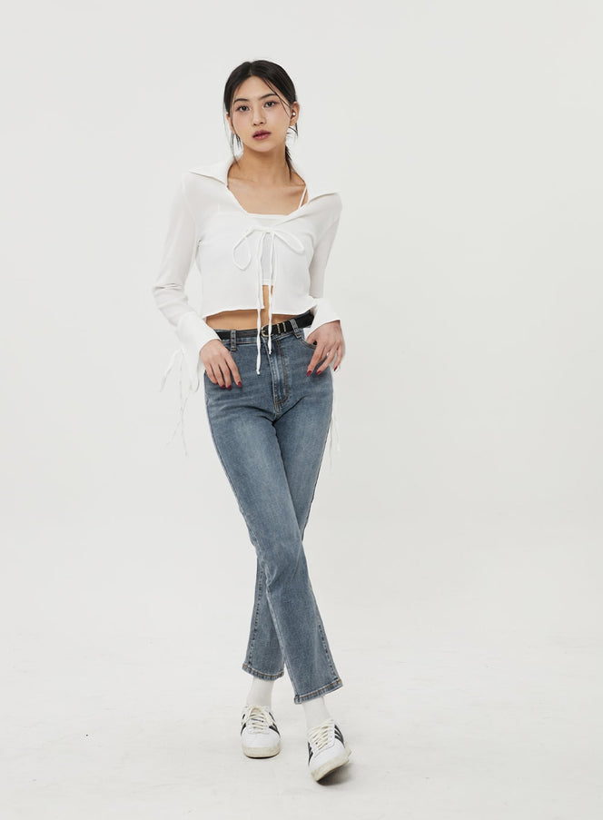 LEWKIN Straight Leg Ankle Jeans BF316 in mid-blue wash, front full-body on model walking, slim straight leg, ankle length, high waist with belt, paired with white tie-front crop top and sneakers.