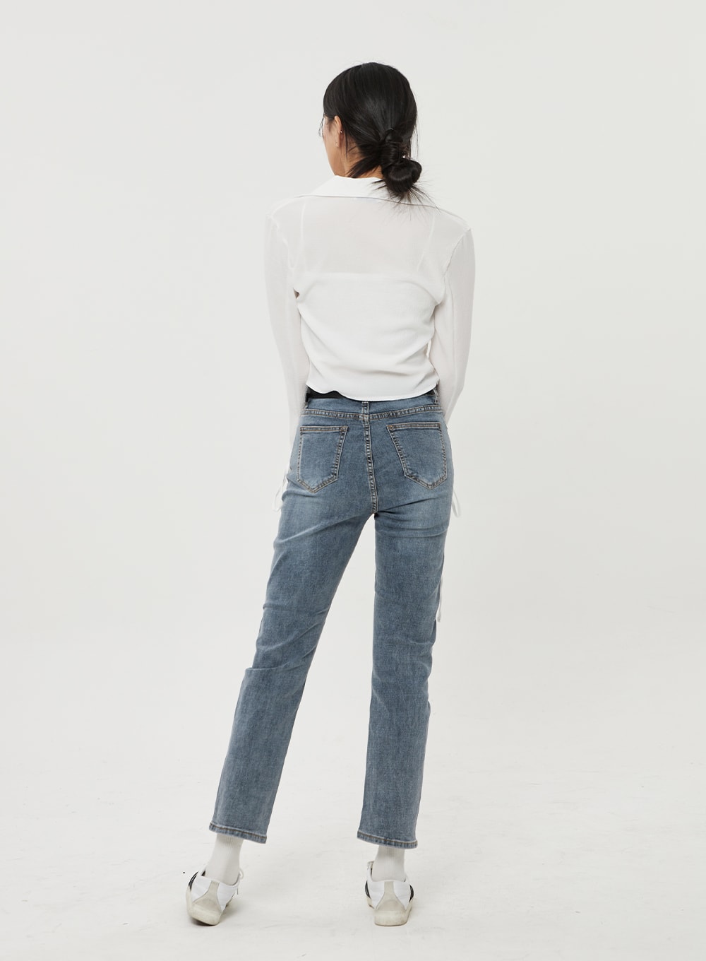 Straight Leg Ankle Jeans BF316 in mid-blue wash, back view on model, showing rear pockets with faded wash detail, slim straight leg and ankle-cropped hem, paired with white top.