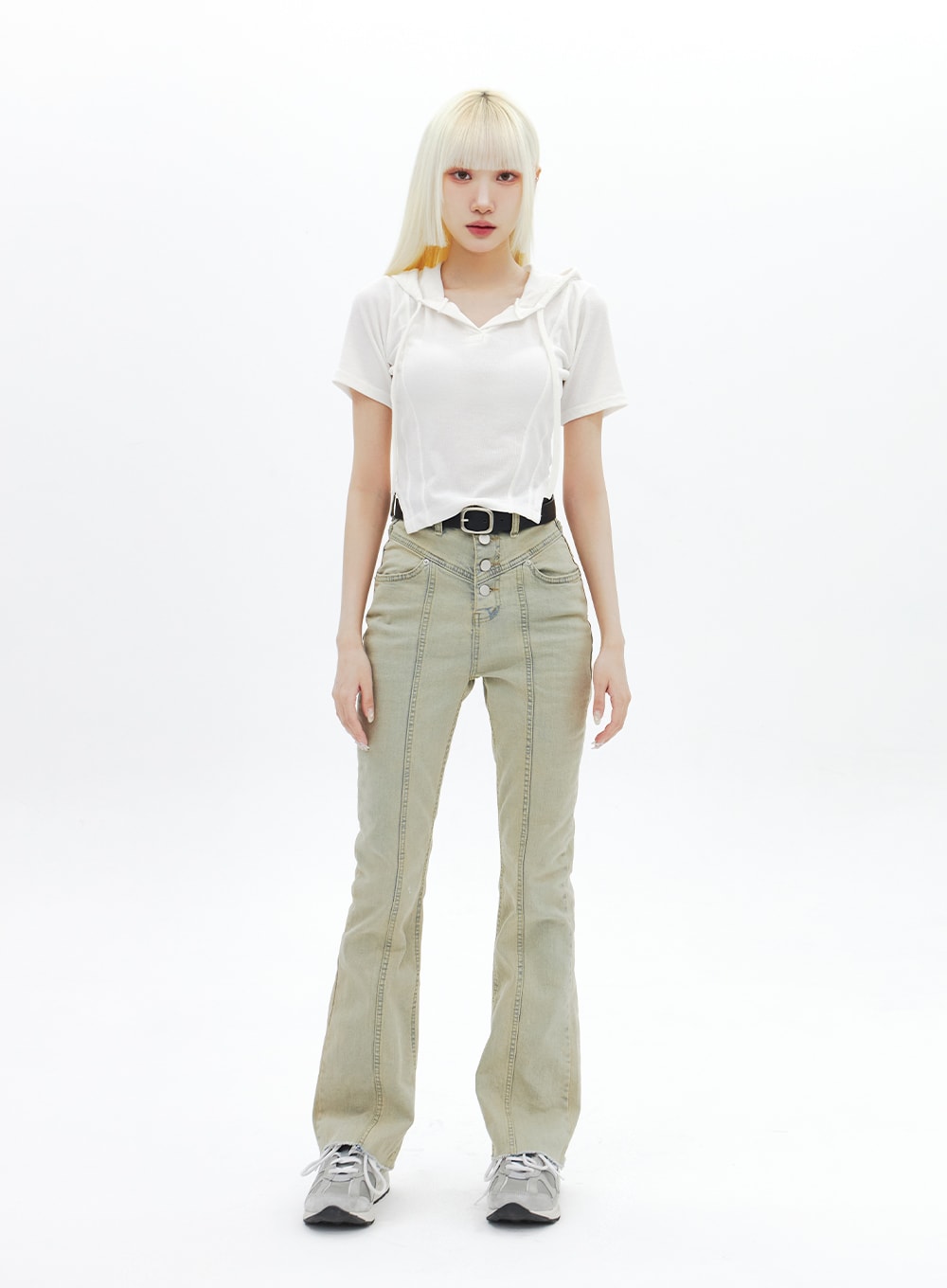 Beige Wash Bootcut Jeans BA320 in beige, full-length front view on model standing straight, slim bootcut fit with front seam detailing and V-yoke waist, styled with white crop tee and sneakers.