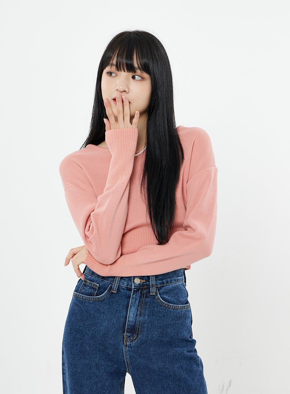 Basic Long Denim Pants BS28 in mid-blue, waist-up close-up on model, high-rise front waistband and button detail visible, cotton denim, paired with pink ribbed crop sweater.