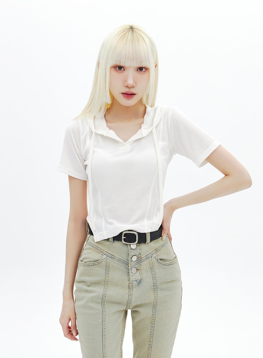 Beige Wash Bootcut Jeans BA320 in beige, mid-length front view on model hand on hip, showcasing V-shaped yoke seam, exposed triple button fly, and washed beige denim with front center seam.