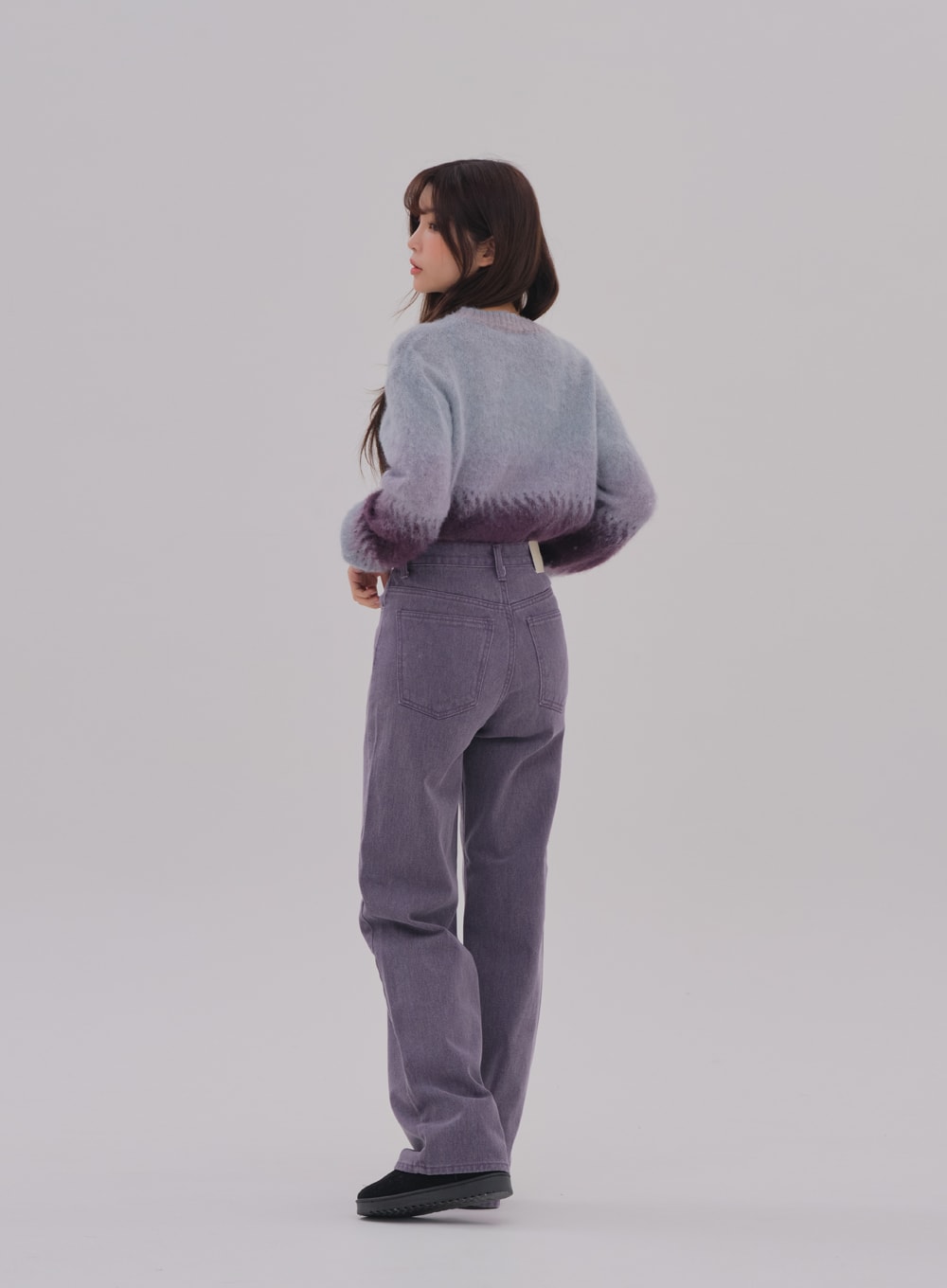 Wide Leg Color Jeans BS-A0812026 in purple, back three-quarter view on model, high-waist wide-fit cotton denim, back pockets and seam detail visible, styled with gradient mohair sweater.