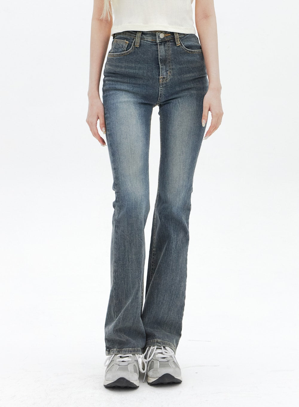 Dark Wash Bootcut Jeans BA320 in dark blue, front torso-to-hem shot on model, high-rise waistband with gold-tone stitching and subtle fading detail, slim bootcut silhouette.