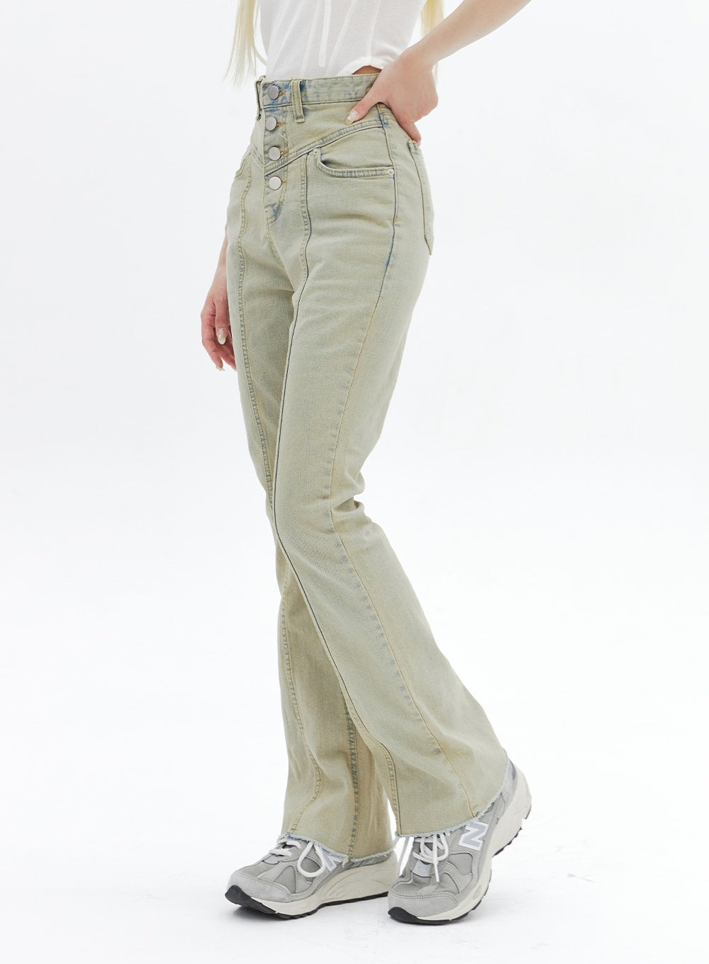 Beige Wash Bootcut Jeans BA320 in beige, side view on model, slim bootcut silhouette with visible center seam, triple button fly and high-rise waist, styled with sneakers.