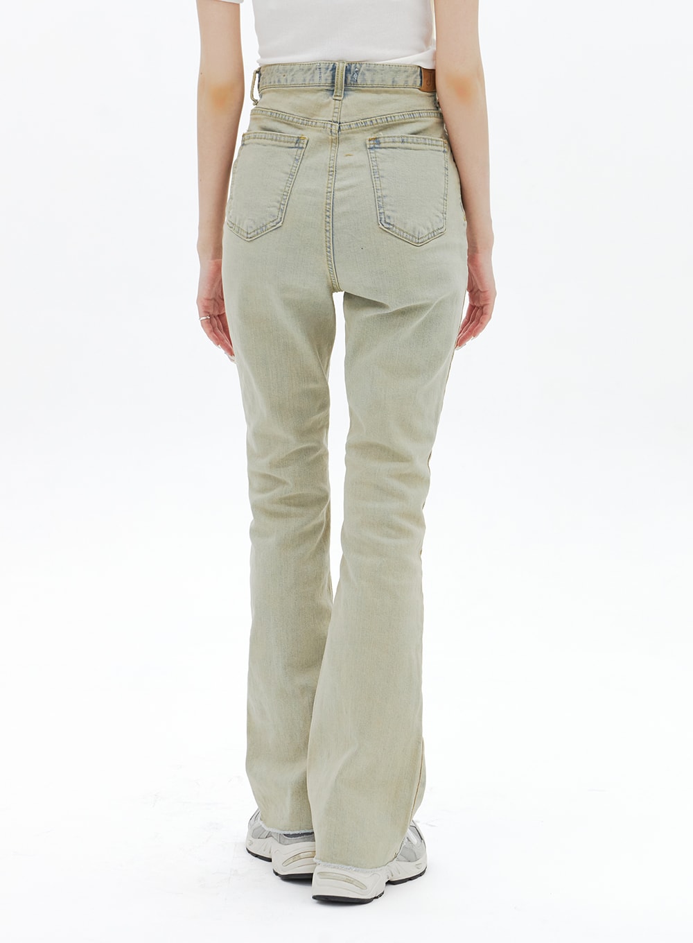 Beige Wash Bootcut Jeans BA320 in beige, back view on model from waist to hem, showing dual back pockets, washed cotton-spandex fabric, and slim bootcut flare silhouette.