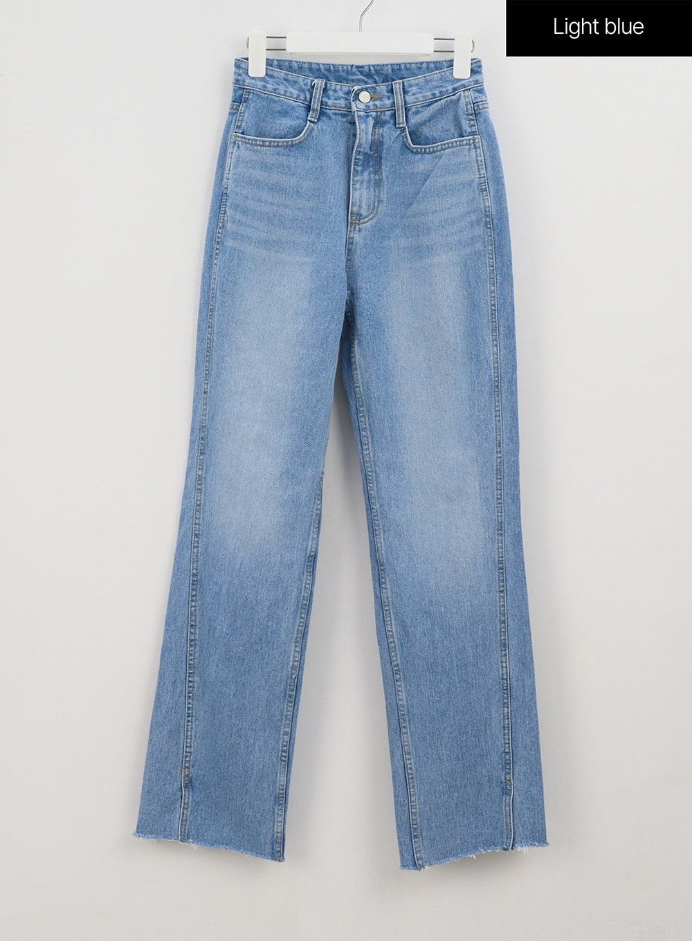 Light Wash Jeans OA310 in light blue, flat front hanger shot, wide-leg washed cotton denim with 5-pocket design, centre crease, and frayed side slit hem.