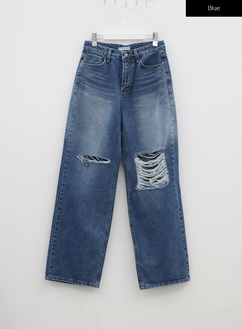 Ripped Knee Blue Jeans BA307 in blue, flat front hanger shot, wide-leg high-rise cotton denim displaying asymmetric destroyed knee rips with frayed edges and vintage faded wash.